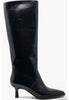 Black knee-high boot with a crocodile texture on a white background