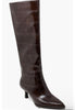 Brown knee-high boot with crocodile pattern on a white background